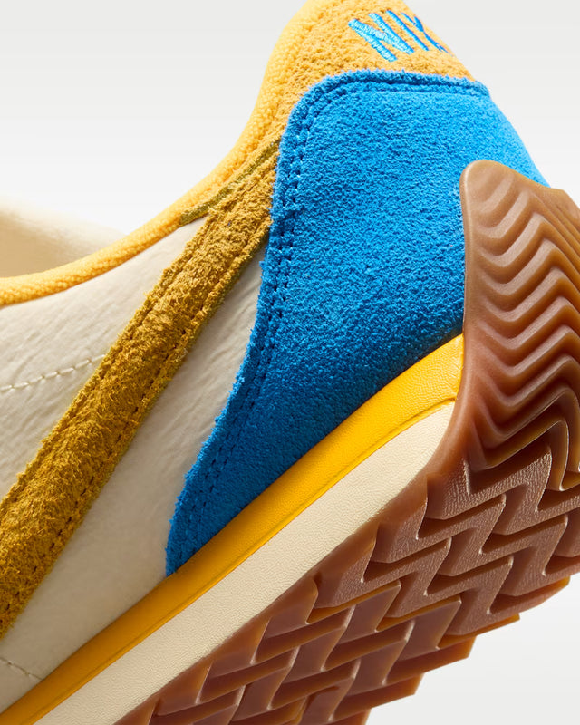 Nike WMNS Pacific - Coconut Milk/Photo Blue/Gum Medium Brown/University Gold